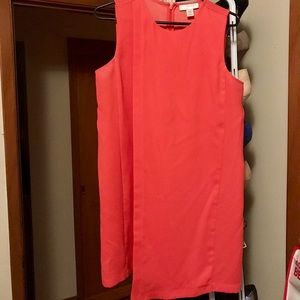 Flirty little orange asymmetrical dress!